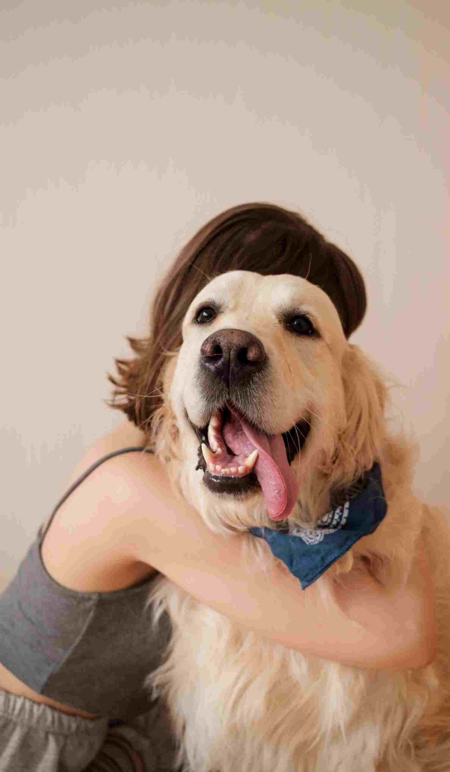 happy dog hugging a vet